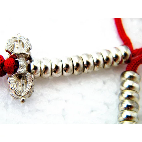 Tradícionális tibeti buddhista számláló dordzse és csengő szimbólummal